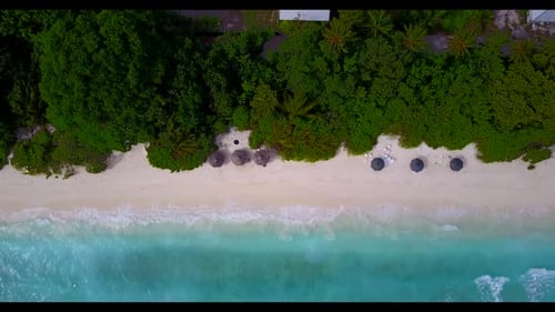Aerial drone view travel of tropical resort beach lifestyle by transparent lagoon with white sand ba
