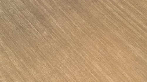 Aerial View of Brown Ploughed Field Agriculture