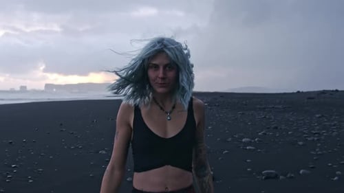 Cool Girl On Black Sand Beach