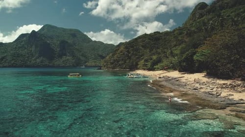 People Cruise Tour Aerial. Boat, Ship at Sand Beach, Philippines. Traveler at Ocean Bay Tropic Water