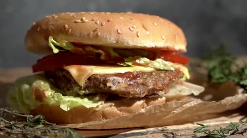 Burger with Cheese, Lettuce and Tomato Close Up