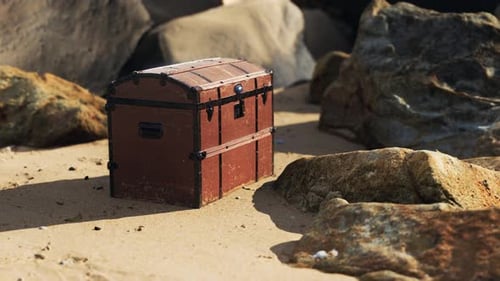 Schatztruhe in Sanddünen am Strand