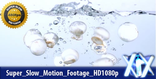 Button Mushrooms Splashing into Water in Slow Motion