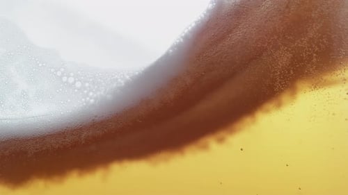 Close Up of Light Beer with Bubbles