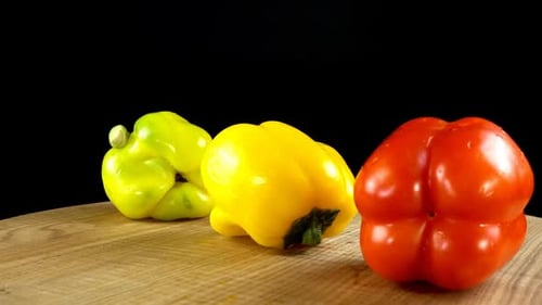 Colorful Peppers Close Up on Wood Surface