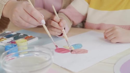 Parent and Child Painting Together