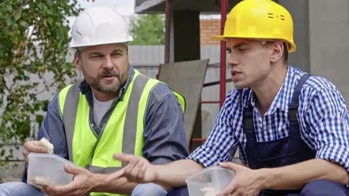 Male Engineers Taking Break at Work