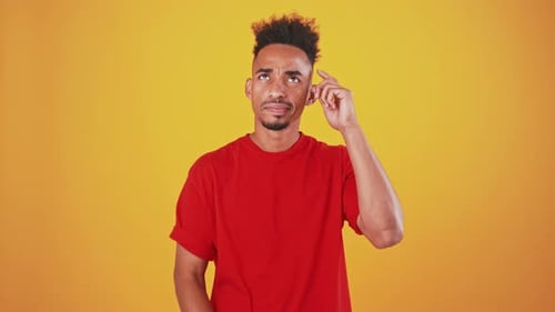 Doubtful Black Guy Comparing Decisions in Head