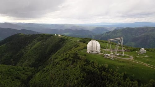 Aerial View of Mountain Observatory on Green Landscape