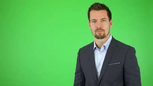 Professional Man Talking on Green Screen Background