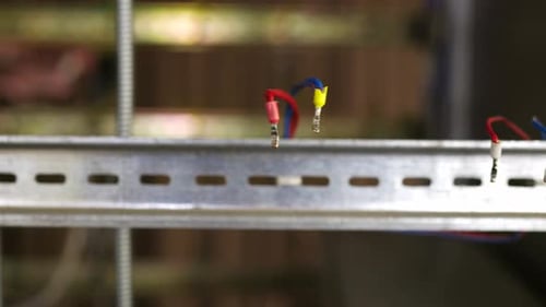 Slider Shot of a Blank Metal DIN Rails in Workshop Laboratory
