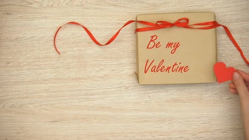 Valentines Gift and Red Heart on Table