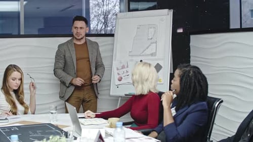 Business Presentation in Modern Office with Team
