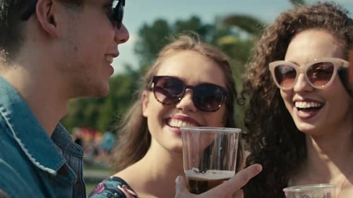 Happy Young Adults Enjoying Sunny Day Together