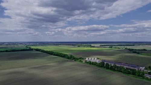 Aerial View of Farmland and Agricultural Structures