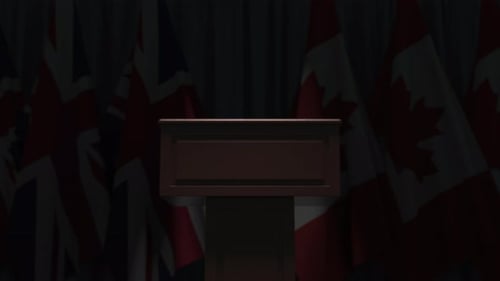 National Flags Rise Behind Podium for Corporate Event