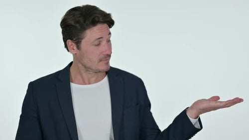 Man Gesturing to the Side with Open Palm