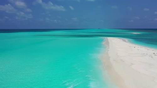 Natural overhead copy space shot of a sunshine white sandy paradise beach and blue ocean background