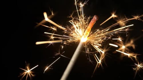 Slow Motion of Burning Sparklers on Black Background
