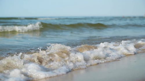 Waves on Sandy Beach