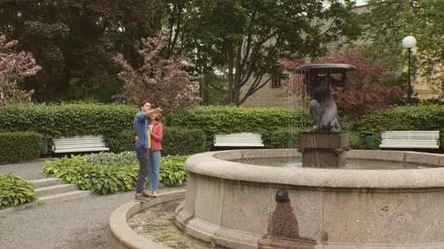 Young, happy, loving couple having date in the park. Relations, friendship and love concept.