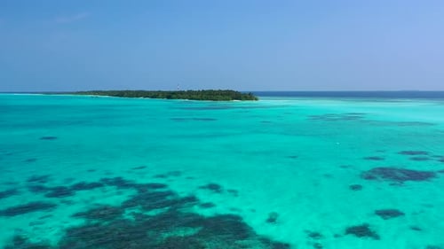 Beautiful aerial island view of a sandy white paradise beach and blue sea background