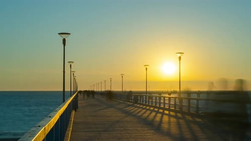 Sunset on the pier in Palanga, Lithuania, time-lapse