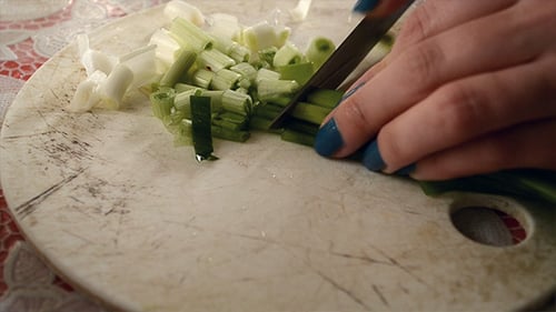 Cutting Green Fresh Onion