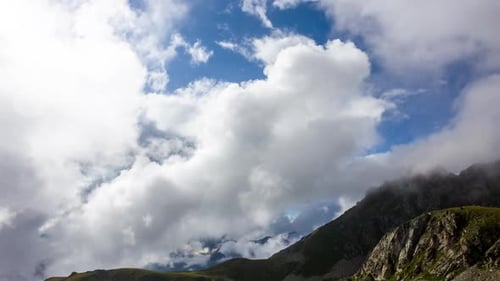 Clouds Hover Over the Mountains