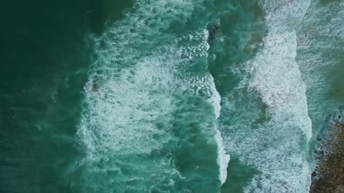 Aerial Top View on Ocean Waves on Portugal Coast