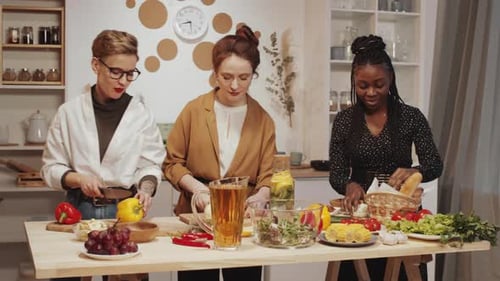 Friends Preparing Food Together in Modern Kitchen