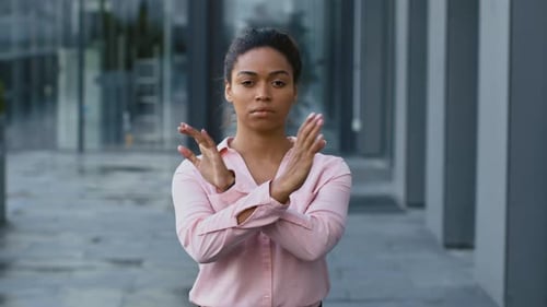 Confident Young African American Woman Manager in Formal Wear Crossing Arms Posing Near Office