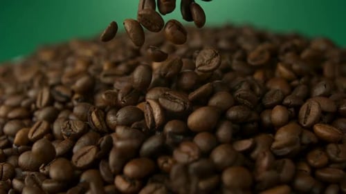 Falling Coffee Beans Heap Close Up