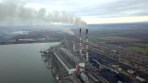 Aerial View of High Chimney Pipes with Grey Smoke From Coal Power Plant