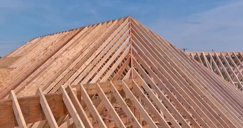 House Construction Site with Exposed Wooden Beams