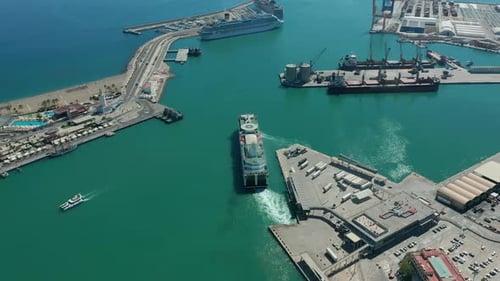 Aerial View. Ferry Ship Leaves Port.
