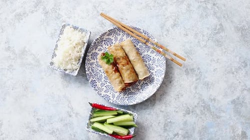 Orginal Asian Deep Fried Spring Rolls Placed on Beautiful Oriental Style Plate