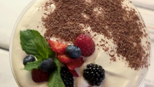 Delicious Dessert with Berries and Chocolate Shavings