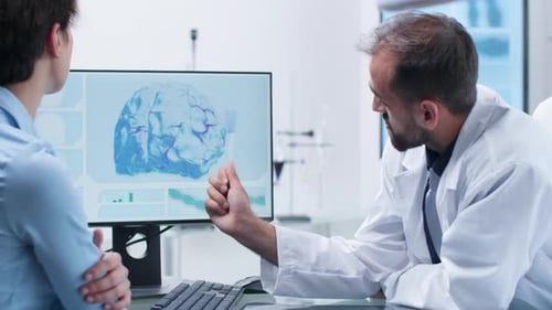 Doctor Explains Brain Scan to Patient