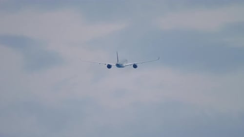 Passenger Airplane Flying in the Sky