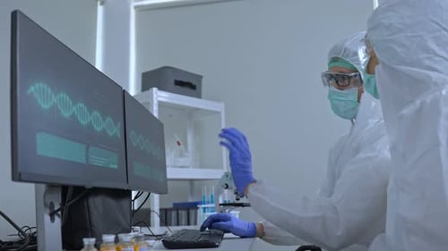 Scientists Analyzing DNA in a Modern Laboratory