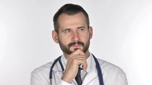 Thoughtful Doctor Wearing Stethoscope and White Coat