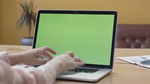 Woman Hands Using Laptop With Green Screen
