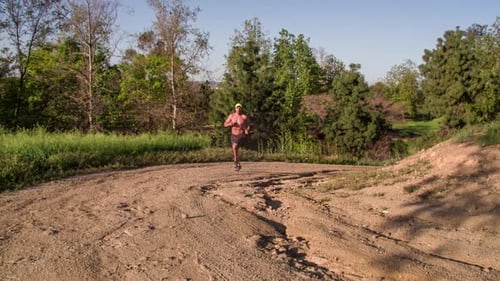 Athletic Male Trail Running Slow-Motion