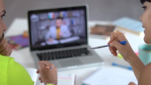 Students Taking Notes During Video Conference Call