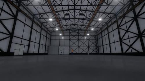 Empty Factory Hangar and Worker