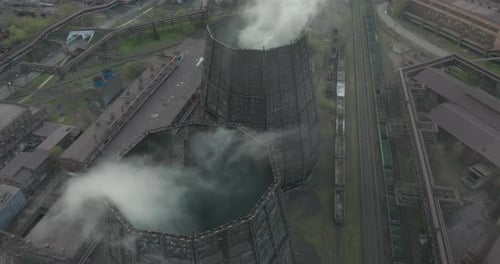 Aerial. Smoke and Steam From Industrial Power Plant. Contamination, Pollution, Global Warming