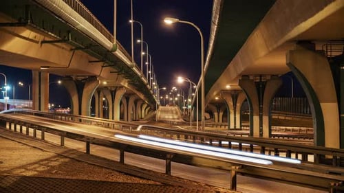 Timelapse Car Traffic Road Junction Highway in Big City at Night