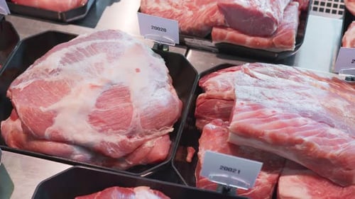 Close Up Appetizing Meat Products Are on Display in Special Containers. Meat Products for Sale in a