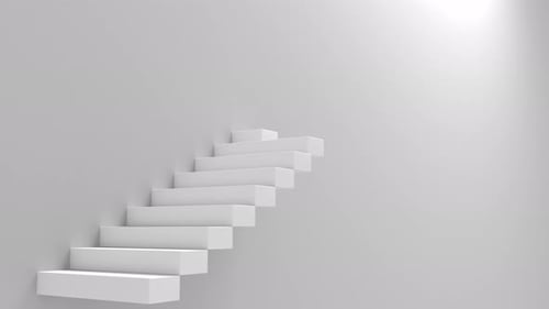 Escalier blanc qui monte vers le futur.
